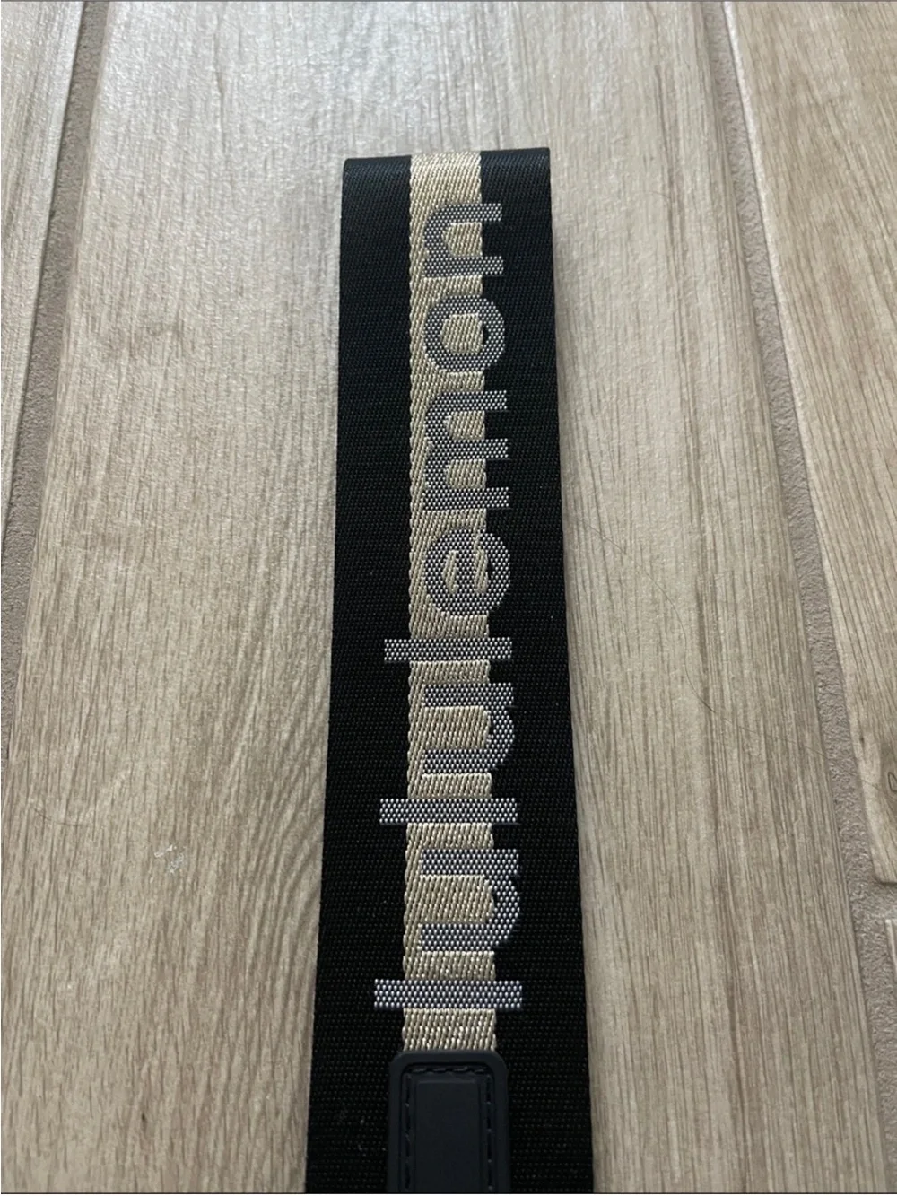 NWT Never Lost Keychain Black/ Gold Wordmark O/S